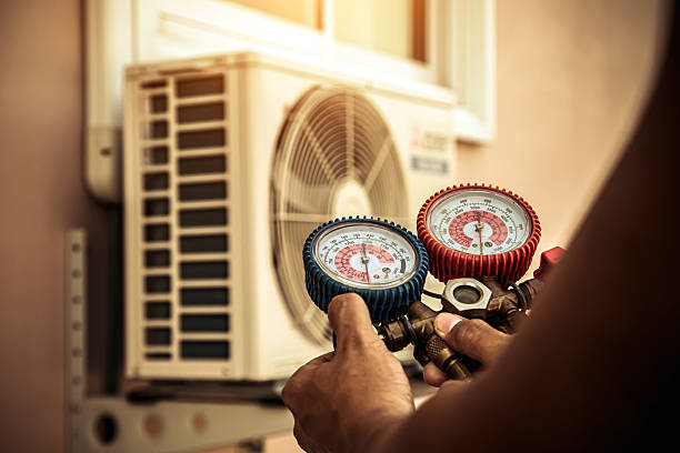 Professional Air Conditioning Service technician working in Jarrettsville, MD